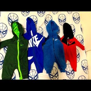 4 NEWBORN NIKE ONESIES